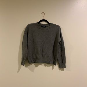 This is a gray sweater from forever 21 that is more like a size small to medium.